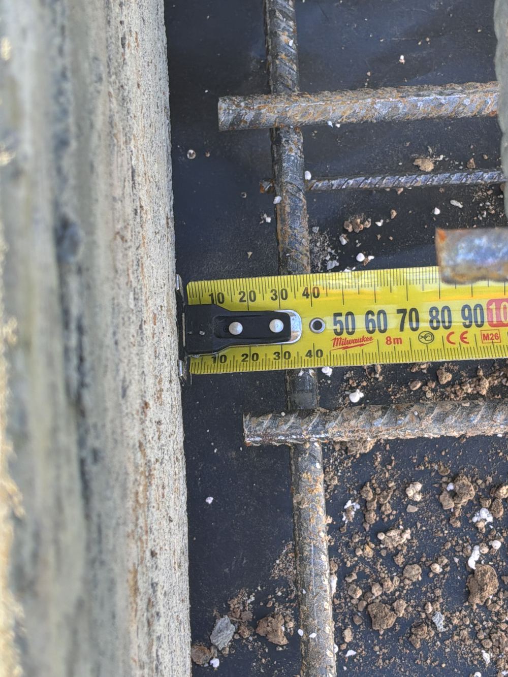 Steel sitting too close to the edge, leaving too little concrete to protect it, found during a slab pre-pour inspection in Rouse Hill