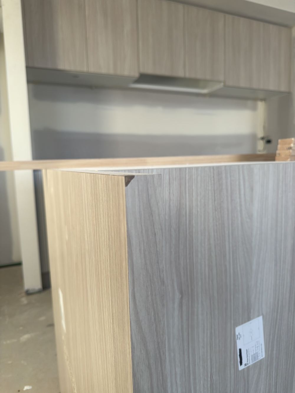 Chipped and damaged laminate on the new joinery, found during a fixing stage inspection in Rouse Hill