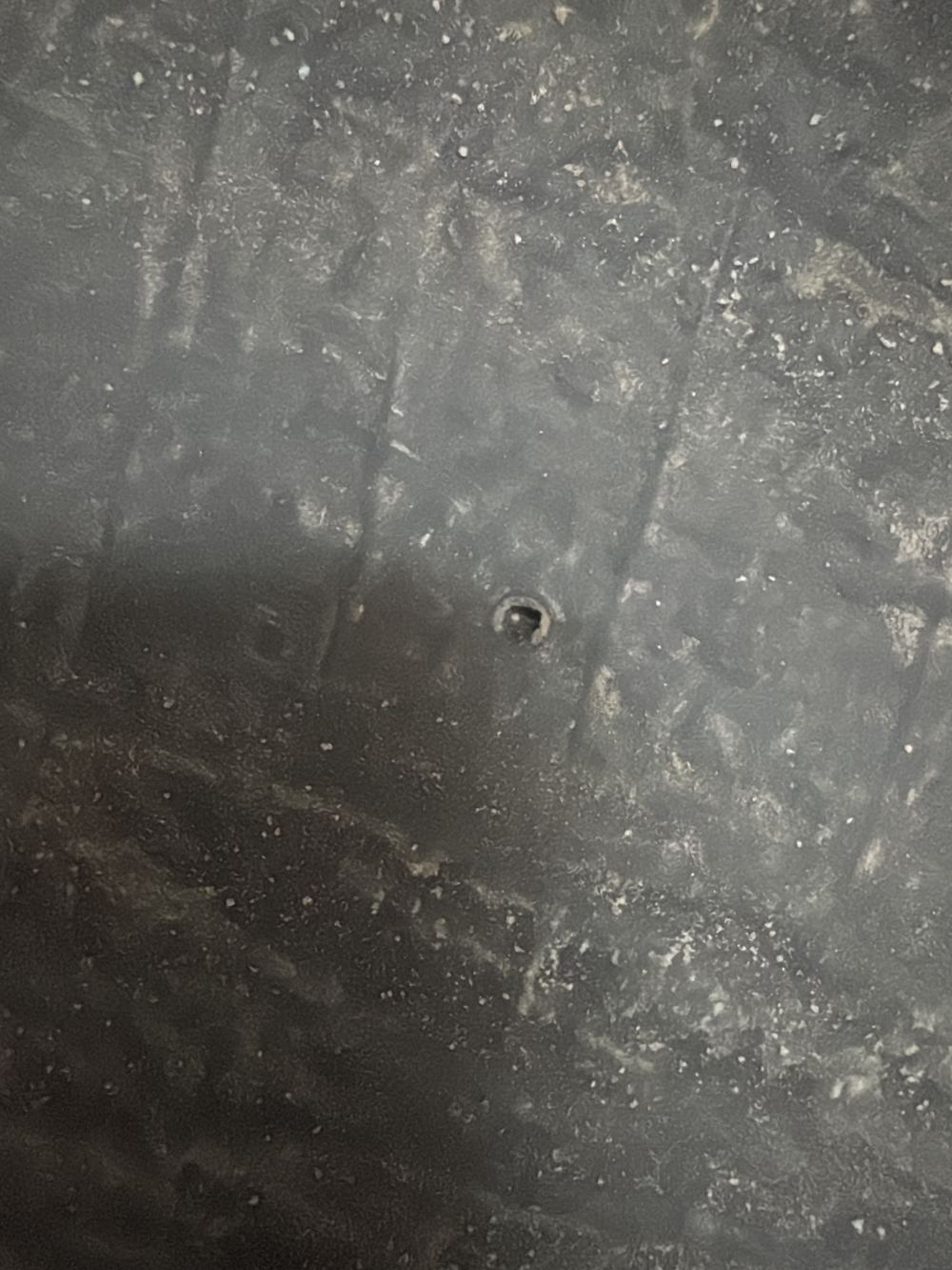 Small pinholes in the shower recess membrane that water can pass through, found during a fixing stage inspection in Rouse Hill