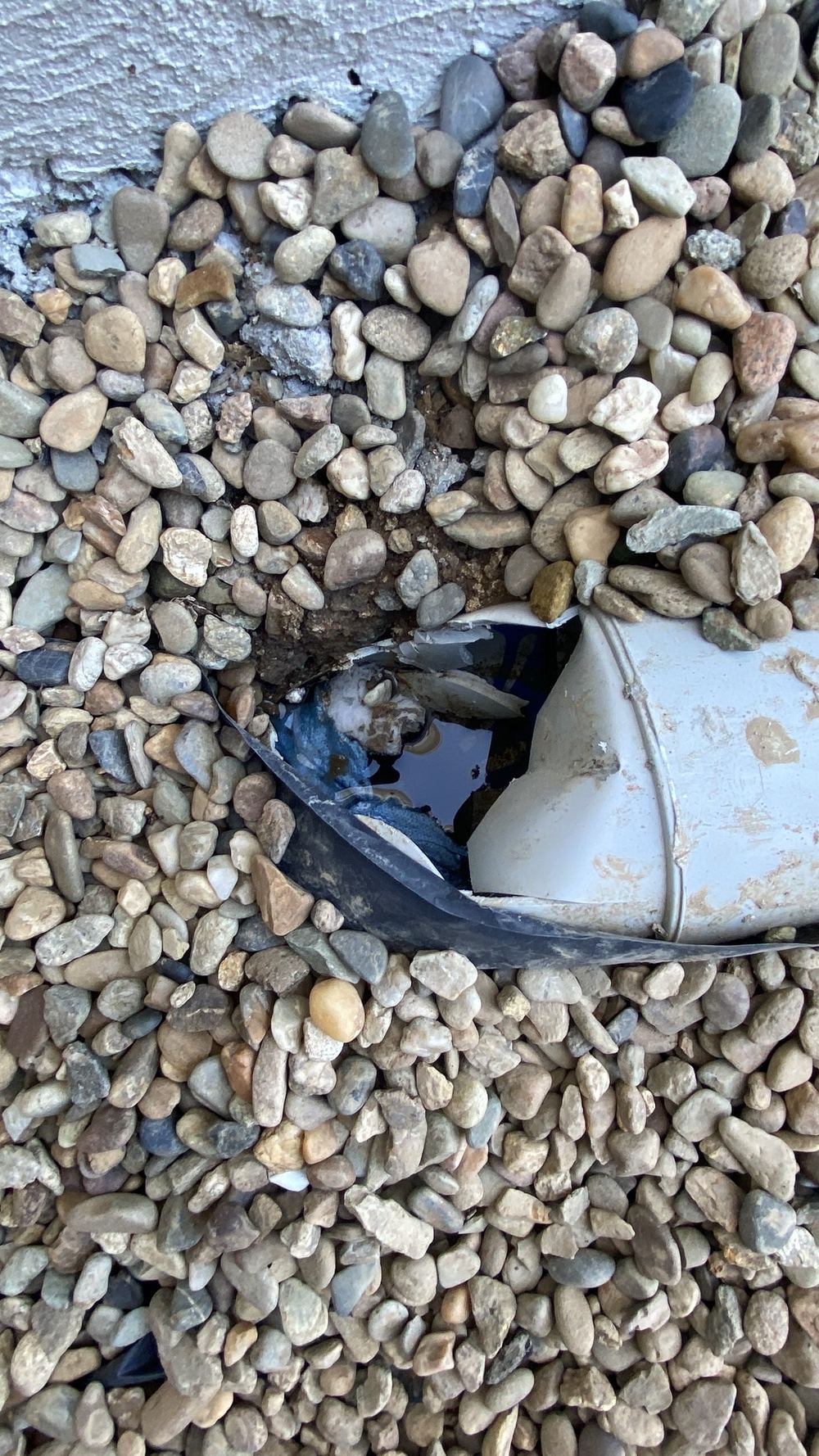 Broken stormwater pipe at handover, with a camera check recommended, found during a handover inspection in Rouse Hill