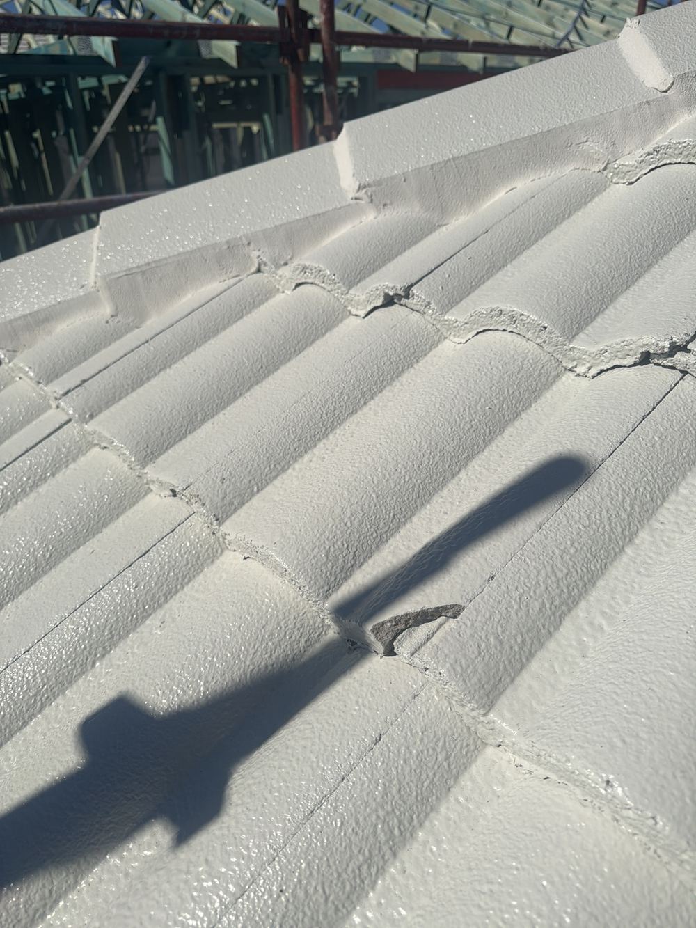 Broken roof tile underlaps that will let water through in heavy rain, found during a lock-up inspection in Rouse Hill