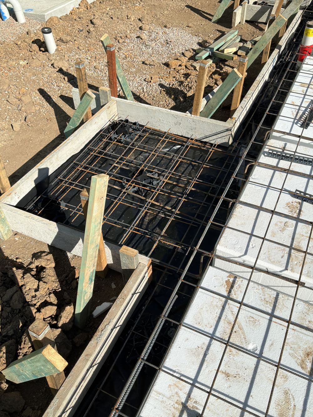 Underlay without the printed rating, so its grade under the slab cannot be confirmed, Rouse Hill